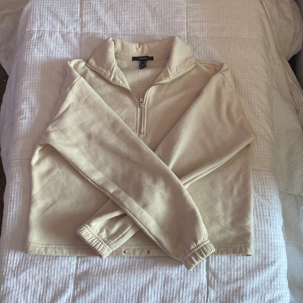 A sweater from forever 21 keeps you pretty warm I like it but I have like ten